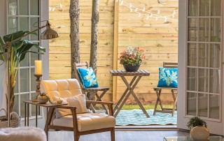 Living room open to patio with patio furniture